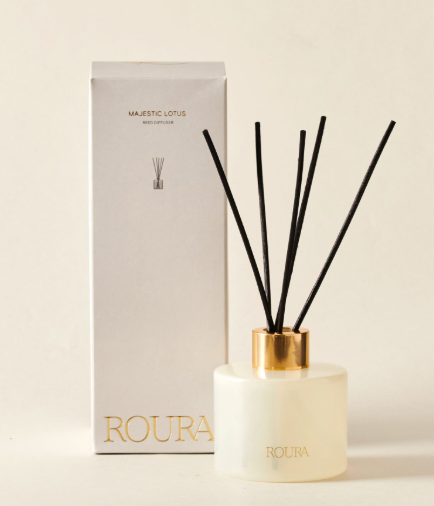 Ambientador mikado Oriental Oud en frasco rayado naranja Roura 100 ml